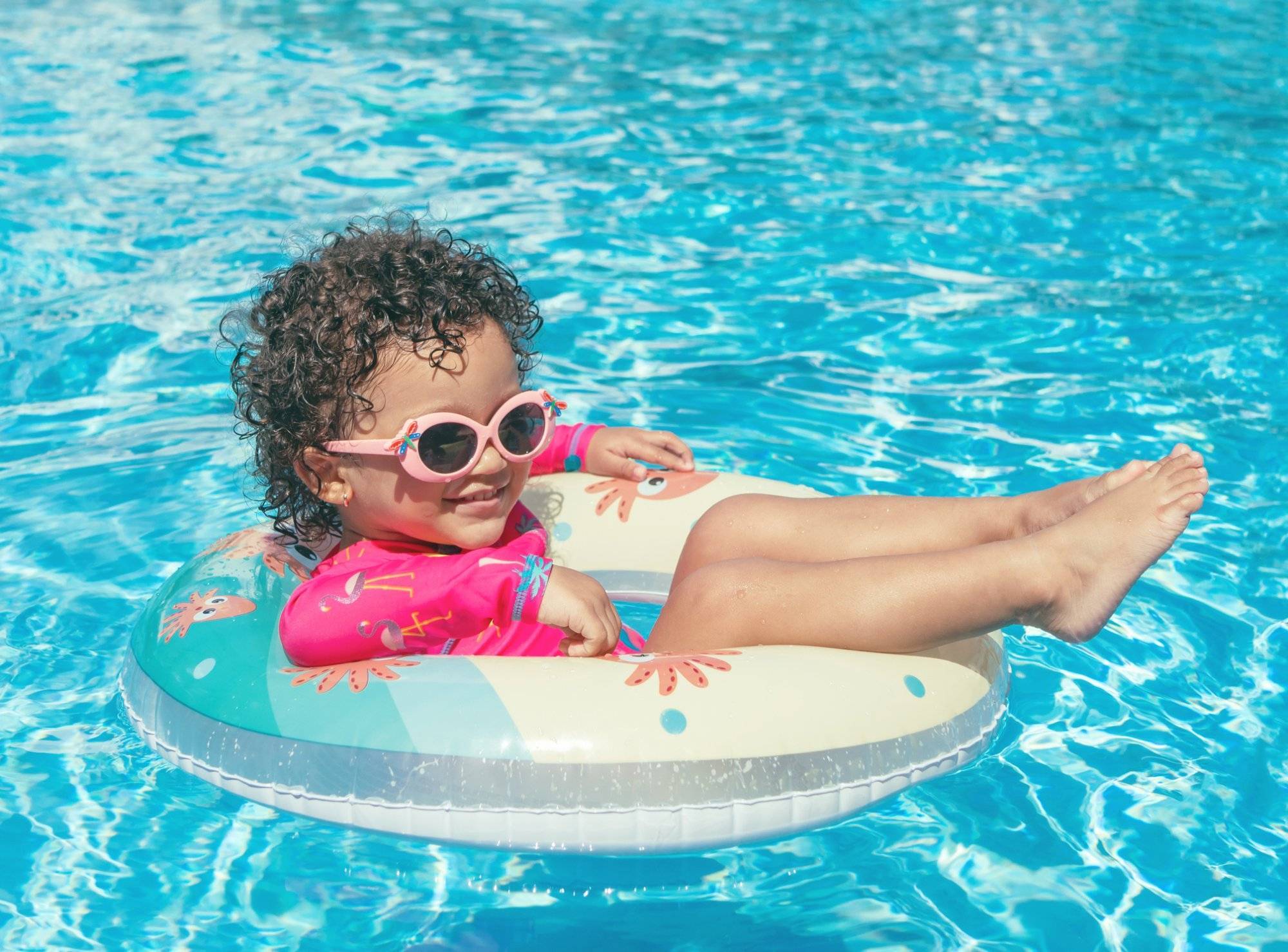 Little girl enjoys the pool